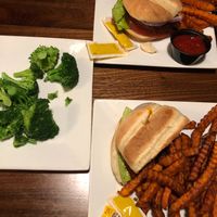 Beyond Burger, sweet potato fries and broccoli at Slippery Otter Pub in West Yellowstone