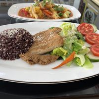 Grilled pork with rice, 60,000 kip  at Vegan Center Cafe in Vientiane