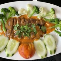 Duck volcano red curry sauce, 70,000 kip  at Vegan Center Cafe in Vientiane