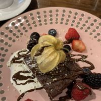 Brownie with fruits and cream  at Don Vegan in Quebec