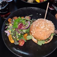 In front the bbq falafel burger, behind the Vevay bowl at Vevay Kitchen in Frankfurt