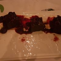 Gluten free vegan brownies with red fruits coulis and creamy ice cream at Pandora Greenbox in Split