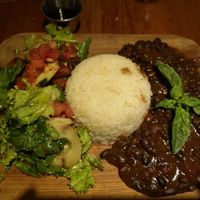 Guiso de porotos negros con arroz y ensalada surtida at Ecole in Pucon