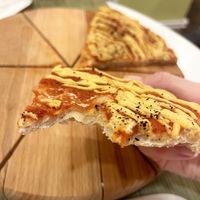 Unfortunately, the dough in Margherita pizza was not baked, it got stuck on the teeth... at Dr Veggie in Yerevan