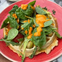 Spinach, vegan pesto, tomato and olives  at Wafflemeister in South West London