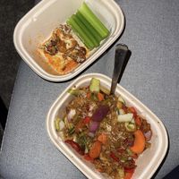 Vegan Buffalo cauliflower (half eaten LOL) and vegan Hunan Kung pao at Earls Kitchen + Bar in Edmonton