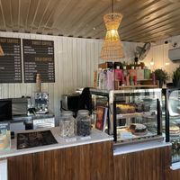 Inside small cafe with outdoor seating   at Kaffi Arugam Bay in Arugam Bay