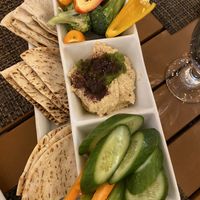 Homemade hummus  with 1/2 veggies and 1/2 pita   at Olive Terrace Bar & Grill in Santa Clarita