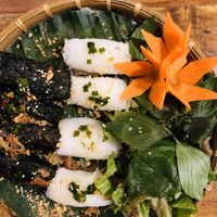 Regional specialities:  rice vermicelli rolls and wrapped vine leaf around tofu at Shamballa Vegetarian Restaurant & Tea House in Ho Chi Minh City