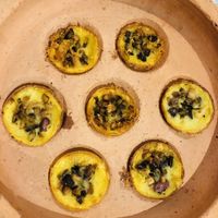 Banh kot, regional specialty of rice paper clay pot roared mini crepes filled with mushroom, wrap in lettuce and greens and dip in sauce  at Shamballa Vegetarian Restaurant & Tea House in Ho Chi Minh City