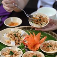Vietnamese Steamed Cakes topped with peanuts and fried onions and served with House sauce. at Shamballa Vegetarian Restaurant & Tea House in Ho Chi Minh City