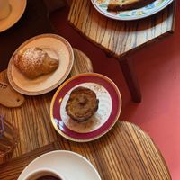 Coffee, custard croissant, Portuguese tart and a frittata    at Life's a Peach in Utrecht