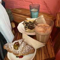 Cornetto pistaccio, fungi focaccia en chai latte  at Life's a Peach in Utrecht