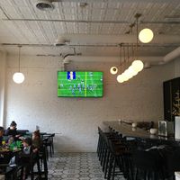 Front bar and seating at Moveable Feast in Wheaton
