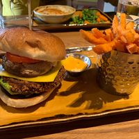 Bean burger with mushroom and non-dairy cheese. I love their sweet potatoes fries!! at The Wheatsheaf in Loughborough