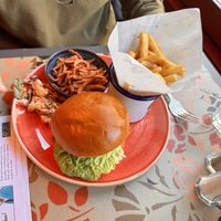 Beyond burger with “bacon” on the side with chips and salad  at Lounges - Clio Lounge in Bangor