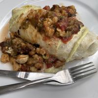 Vegan burrito with vegan green sauce  at Cafe 13 in Golden