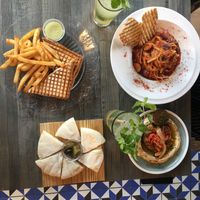 Hummus sabich with falafel and pita. Fettuccini melanzane no cheese. & non vegan Cuban panini  at Toasteria - Xinyi in Taipei