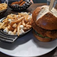 "Chicken" burger and Poutine at Bowhead Pub in Montreal