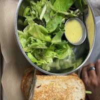 Pesto chicken sandwich with side salad   at Sea Salt Healthy Kitchen in St Simons