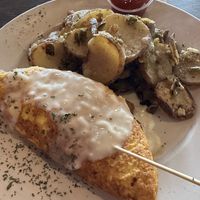 Vegan Meat Lovers Omelette with Potatoes 🥔   at Plant Based Mafia in Palm Beach Gardens