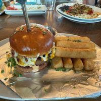 vegan burger with vegan cheese and avocado, side of yucca fries at Charro Vida in Tucson