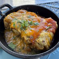 Chimis- smothered. I don’t think the smother is necessary, I preferred it when it was dry w guacamole actually but still good   at Charro Vida in Tucson