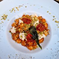 gnocchi di patate con pesto di pomodori secchi e "ricotta" fatta in casa at Cavo Bistrot in Cagliari