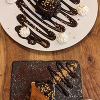 Chocolate Brownie and Cheesecake with Caramel- and Chocolatesauce at Cavo Bistrot in Cagliari