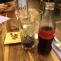 Coke and rest of olives 😁  at Cavo Bistrot in Cagliari