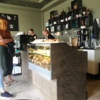 Vegan cinnamon rolls can be seen on top of the counter at Melkebaren in Bodo