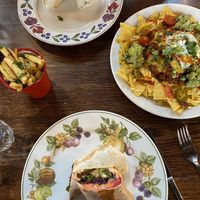 Seitan wraps, chilli nachos and garlic & parsley fries at Cosmic Kitchen in Plymouth