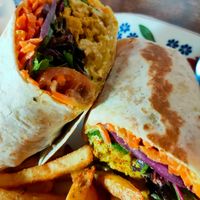 Caribbean curry wrap
and paprika fries at Cosmic Kitchen in Plymouth