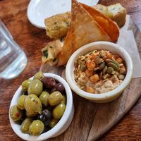 Marinated olives + hummus & bread at Cosmic Kitchen in Plymouth