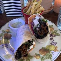 Delicious Seitan kebab, incredible garlic parsley fries, and tasty tzatsiki dip.  at Cosmic Kitchen in Plymouth