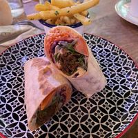 Shawarma wrap with garlic and parsley friesd  at Cosmic Kitchen in Plymouth
