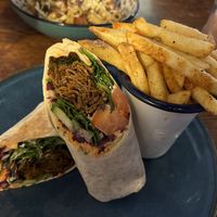 Shawarma wrap with paprika fries   at Cosmic Kitchen in Plymouth