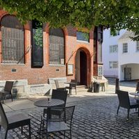 Outside eating area in the square at Cosmic Kitchen in Plymouth