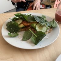 Toast with avocado, cucumber, tomato, alfalfa sprouts and spinach. at Klein Geluk Ontbijt in Heemskerk