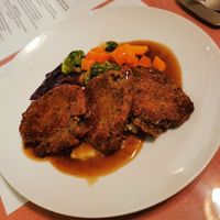 Homemade haggis style fritters with mash, veg and gravy. at Ginger Vegetarian Cafe in Halifax