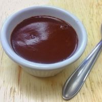 Vegan dessert with ganache and coconut. at Ve - Emporio e Restaurante Vegano Moinhos in Porto Alegre