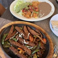 4 Flour tortillas would never be able to use all this Chickun   at Fiesta Grande in Mount Dora