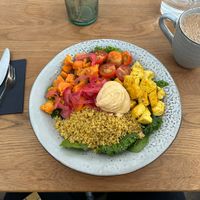 Lunch bowl: quinoa, sweet potatoes, tofu, hummus and salad  at Roots Helsinki in Helsinki