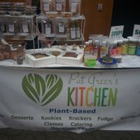 Pat Greer's Kitchen market display. Kombucha, bean mixes, raw crackers, chips, & dips, raw & cooked desserts. All deliciously vegan of course! at Pat Greer's Kitchen in Houston
