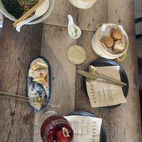 Multiple dishes including k pop gyoza  at Vistro in Bangkok