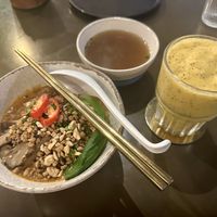 Dan dan noodles and tropical smoothiee  at Vistro in Bangkok