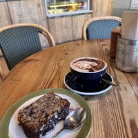 Banana bread + Cappuccino   at Pipet & Co in Menorca