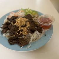 Lemongrass Noodle-Rice noodles, TVP cooked with lemongrass, onion, bean sprouts, lettuce, roasted peanuts on top (Side of Aulac sauce)  at Loving Hut in Orlando