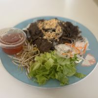 Lemongrass Noodle-Rice noodles, TVP cooked with lemongrass, onion, bean sprouts, lettuce, roasted peanuts on top (Side of Aulac sauce)  at Loving Hut in Orlando