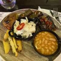 Vegan plate. Really good pickled cabbage and stuffed vine leaves   at Te Fisi in Shkoder